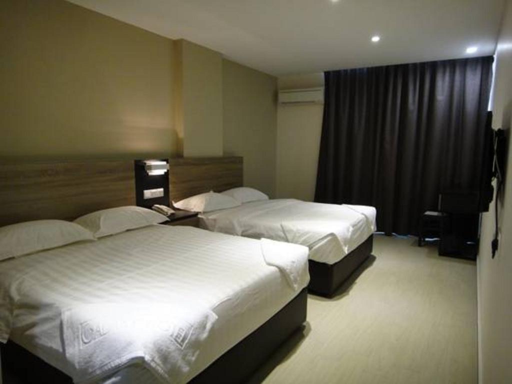 Galaxy Hotel Simpang Ampat  Camera foto